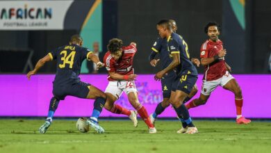 mothobi mvala of mamelodi sundowns challenges emam ashour of al ahly during the african football league 2023 match between al ahly and mamelodi sundowns