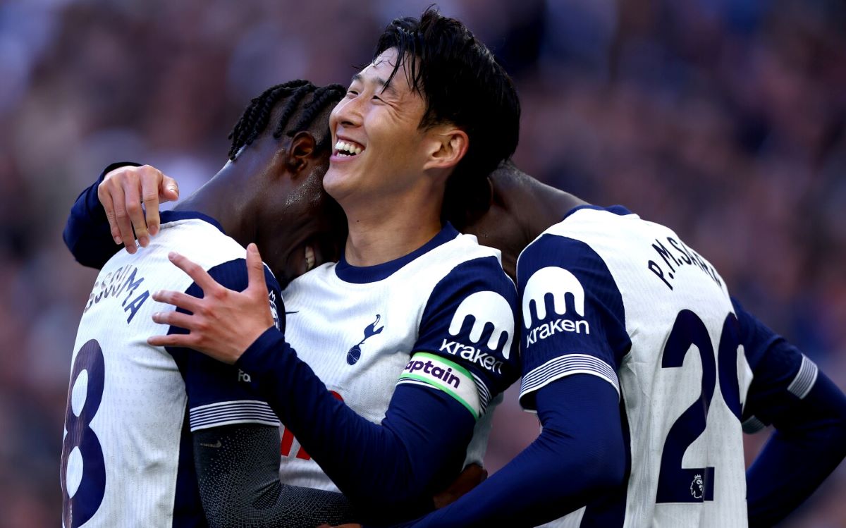 Son Heung-min celebrates with teammates after scoring Tottenham Hotspur's second goal during a match