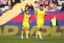 Las Palmas player celebrates his goal against Barcelona