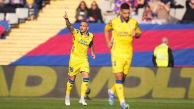 Las Palmas player celebrates his goal against Barcelona