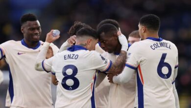 Chelsea players celebrate a goal against Leicester City