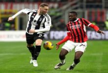 Milan and Juventus players compete for the ball