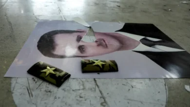 A distorted picture of Bashar al-Assad on the ground