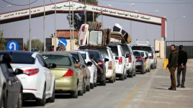 Cars stuck at the entrance to Jordan