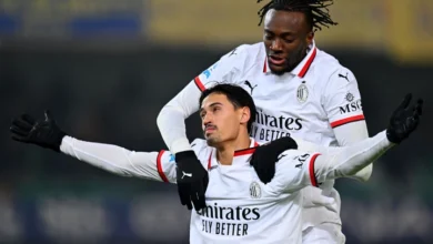 Tijjani Reijnders celebrates his goal against Verona with Rafael Leao.